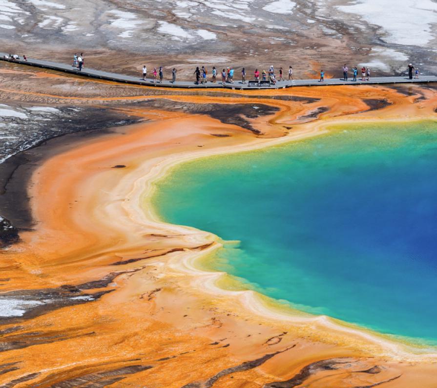 GRAND PRISMATIC SPRING PHOTO BY SERGIO LANZA CASADO The center of Yellowstone s Grand Prismatic Spring steams at 199 Fahrenheit (93 Celsius), too hot for the multicolored bacteria clustering on the