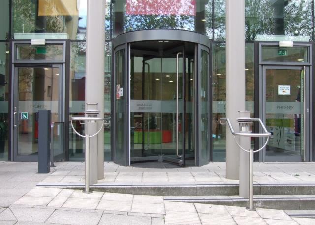 The accessible entrance to the building is through the first door on your left as you look at the building.