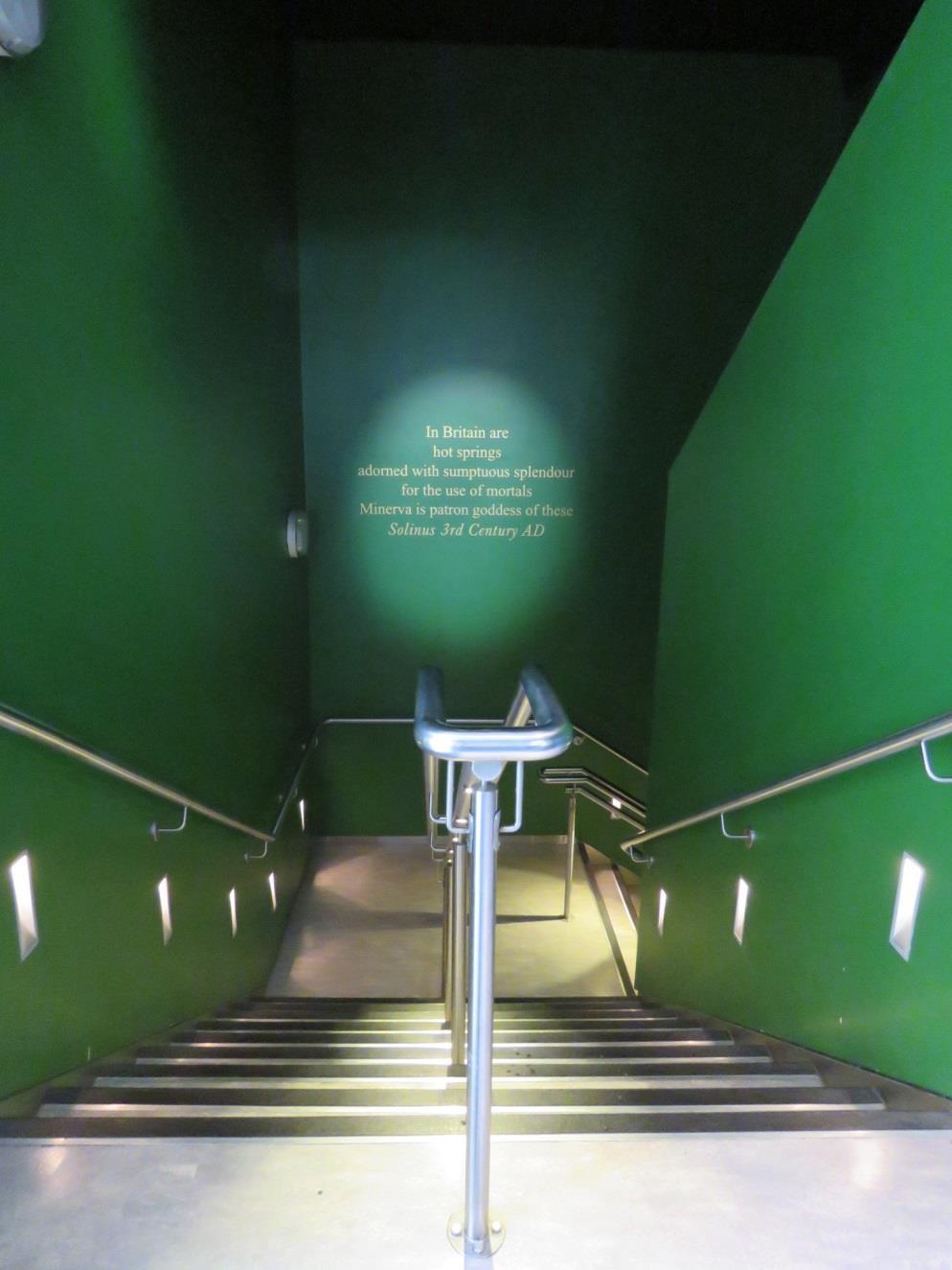 When I am ready, I will go down these stairs into the museum. The museum is underground.