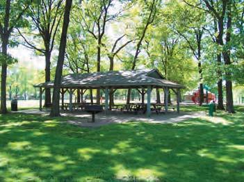 trees, a horseshoe pit, and a picnic shelter.