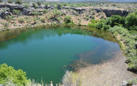 The Sinagua: Montezuma Well Though Montezuma Well is part of Montezuma Castle National Monument, it is separated from the Castle by about four miles via McGuireville and