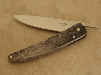 Friction Folder The Friction Folder is a lever operated folding knife that uses
