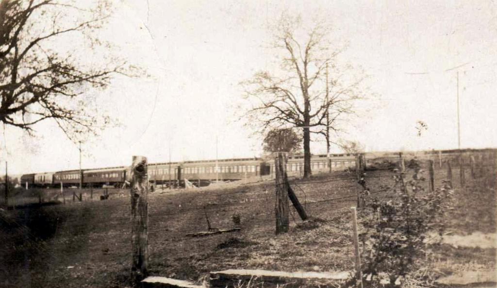 Passenger cars block Old Hackett Road in this April 8, 1928 photograph of a special train at Greenwood.