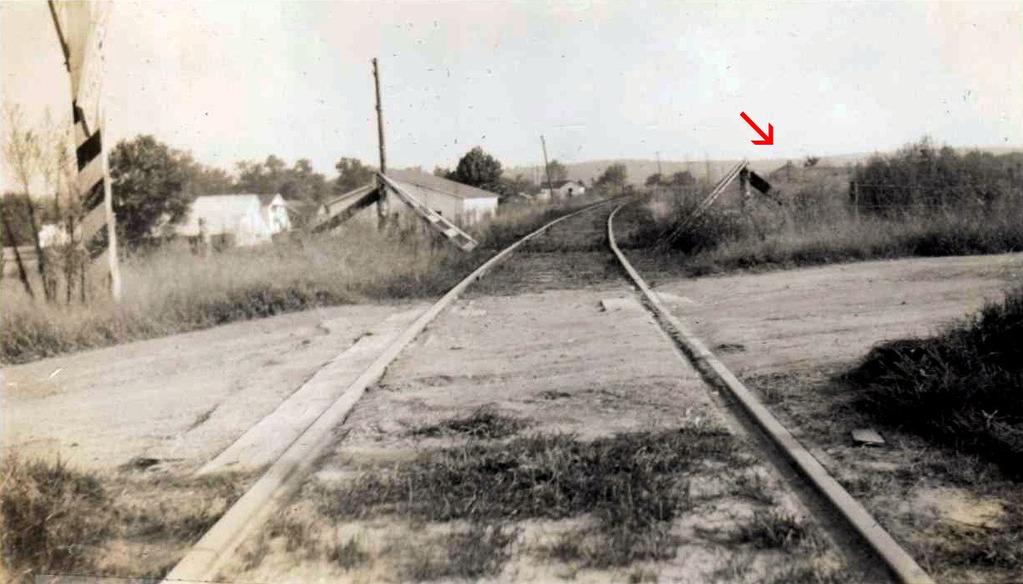 It s 1951 and Old Hackett Road in Greenwood is still unpaved. The depot can barely be seen to the south (red arrow).