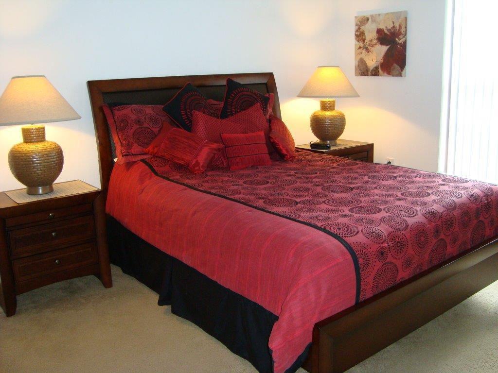 The master bedroom has a queen size bed.