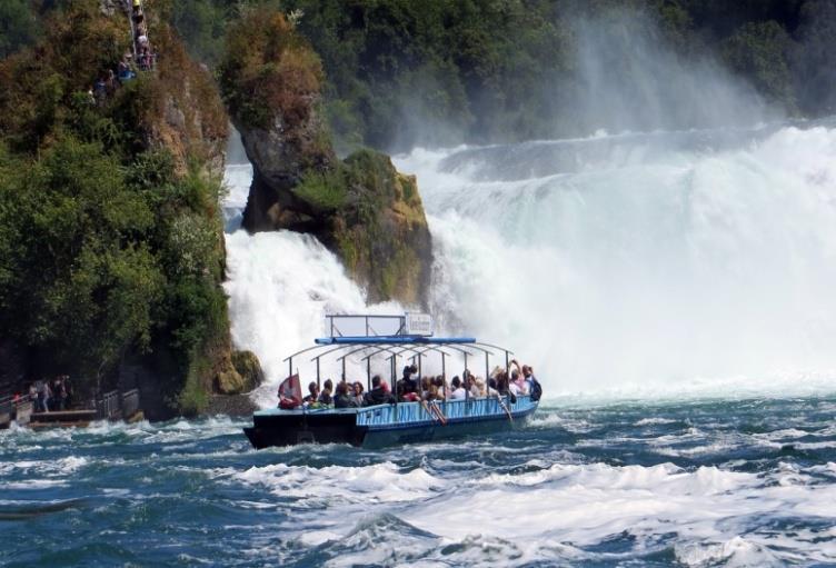 Arrive Zurich and start the tour with visit to Rhine Falls along with an amazing Boat ride.