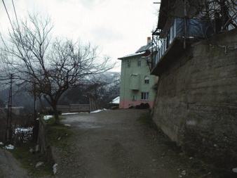 Buildings: Many gabled houses shared similar scales sides faced the valley (Fig. 11, 12, 14).