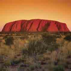 Rise early and enjoy a tea or coffee as the sun casts its first rays on Uluru. rive out to the domes of Kata Tjuta and walk deep into Walpa (Olga) Gorge. Later, travel to Kings Canyon.