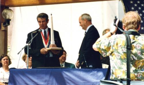 On April 7, 1990, at the suggestion of Baron Michon-Coster, the first half of the Sister City ceremony took place in Williamsburg, Virginia, with several Trustees, Supervisors, the Honorary Consul of
