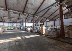 It is located in close proximity to other commercial buildings and the Melje industrial zone.