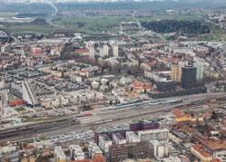 The property lies along Ljubljana s central railway station and bus terminal, surrounded by many businesses, educational, cultural institutions and fairgrounds, as well as residential complexes.