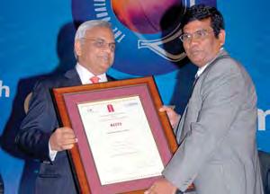 - Business Excellence receiving the certificate.