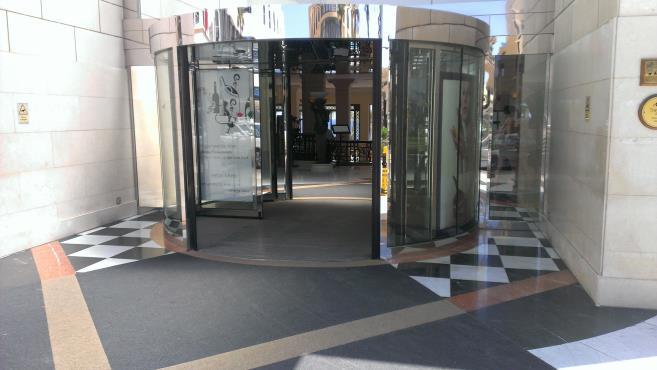 The main entrance consists of a revolving door which is open during the day.
