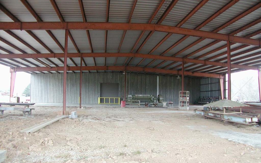 MANUFACTURING/WAREHOUSE SPACE 180' 30' 30' 30' 30' 30' 23' 7' 120' CONCRETE SLAB 18'-9" CEILING HEIGHT UNDER SUPPORT BEAMS 12' WIDE X 14' HIGH OVERHEAD ROLL UP DRIVE-THRU