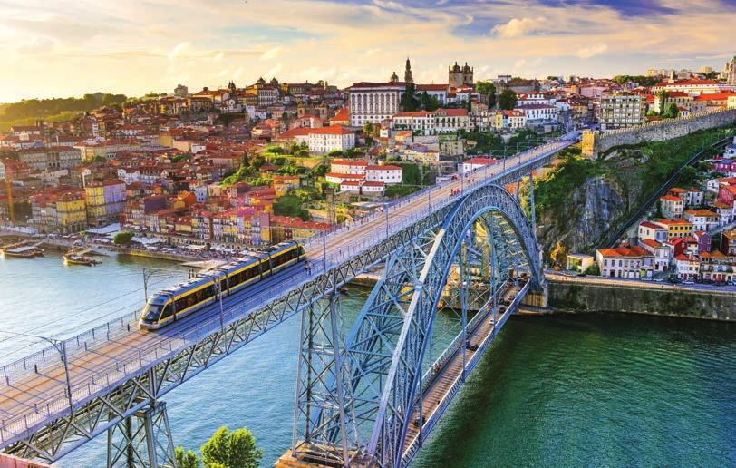 7 WHY PORTUGAL Being one of the warmest countries in Europe, Portugal enjoys a lush landscape bursting with bougainvillea, coast-side cliffs and golden beaches.