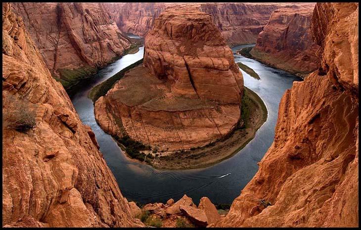 HORSESHOE BEND Tamed by the Glen Canyon Dam, the emerald-green Colorado River makes a gigantic bend more than a thousand feet below the overlook, swinging first to the east, and then curving back to