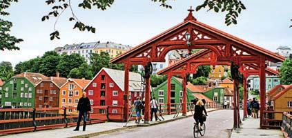 While you are here, be sure to stroll across Gamle Bybro (the Old Town Bridge), which dates back to 1861, and see the charming, restored wooden buildings of the Bakklandet district.