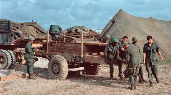 setting some timber bridges on fire. Bridges that C Company had built. This convoy has to be one of the most unorganized ones in all Vietnam.