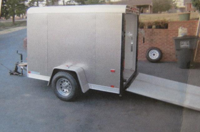 Locks, Luggage Rack. Comes with Matching Trailer. Also EZ Load V-Nose Trailer Spare & mount included. $1650 Fred Ray 931-303-6553 Safety First!