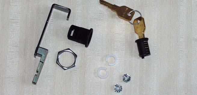 Kit, Lock Assembly The kit is used on the flipper door and includes: (1) plastic lock cover, (2) nuts, (2) washers, (1) lock bar, (1) lock housing, and (1) tumbler with keys.