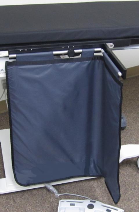 Table Shielding #M-462 Table to Floor Shield This BR exclusive design provides excellent shielding on a one piece apron. 0.5 mm Pb equivalency. 30 W x 28 L, hinged 11 in from end.