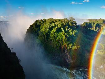 Day 10 Tour of the Falls - Zimbabwe - Thrill yourself with the memorable opportunity to explore the breathtaking rainforest that surrounds the majestic