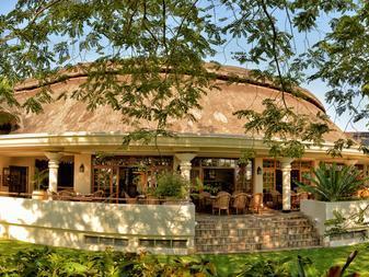 Ilala Lodge A warm Zimbabwean welcome awaits guests at Ilala Lodge, which is built on the closest site to the majestic Victoria Falls.
