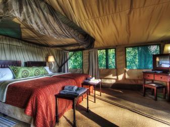 Guests can relax in the comfort of an East African-style safari tent, which is raised on a teak platform, providing mesmerising views of the lodge s surrounds.