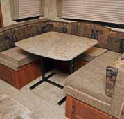 includes a refrigerator, stove top, sink and extendable countertop all without