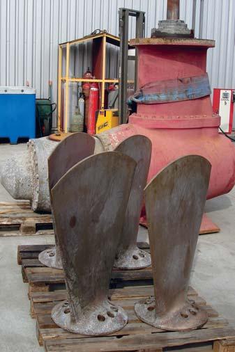 Thruster unit and propeller blades at Hydrex headquarters prior to overhaul Welding work on blind flange used to seal off thruster unit after blade removal After fast stops in Dunkirk and Hamburg the