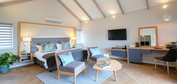 ACCOMMODATION GARDEN SUITES Knysna Hollow accommodates guests in 44 spacious,