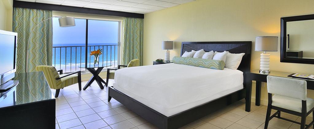Be energized by the ocean sounds that tall sliding glass windows bring in to your room.