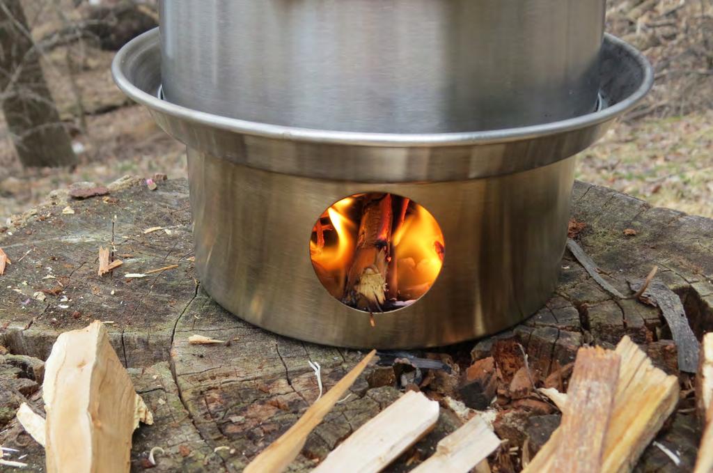 You can easily check the status of your fire and fuel by peering into the round cut out in the fire base.