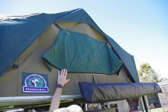 The window at the rear of the tent, is not easily opened because the bows interfere with the rear awning.