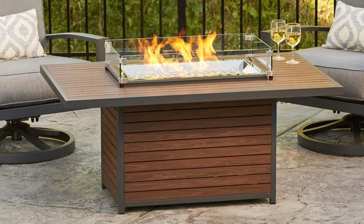 propane tank in base Distressed cedar paneled base is unique to each fire pit table, wood color and grain pattern will vary Grey glass burner