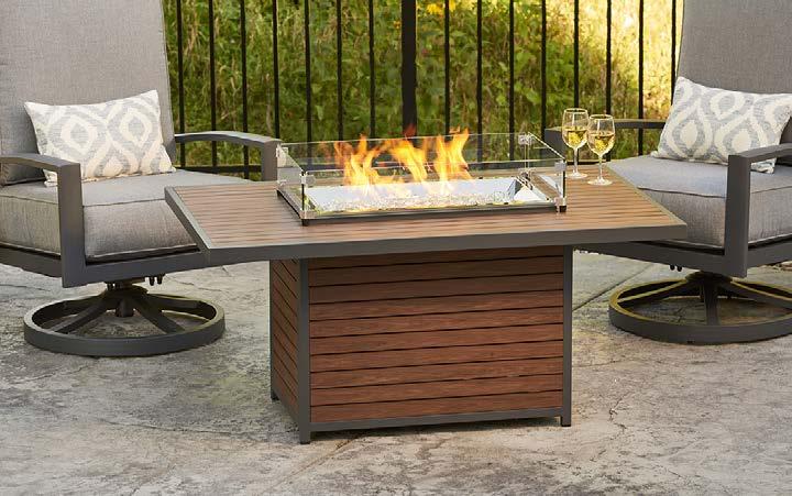 propane tank in base Distressed cedar paneled base is unique to each fire pit table, wood color and grain pattern will vary Grey glass burner cover included