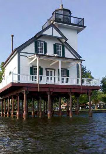 Roanoke River Lighthouse after its exterior restoration waiting to be moved to its new location on stilts over the water.