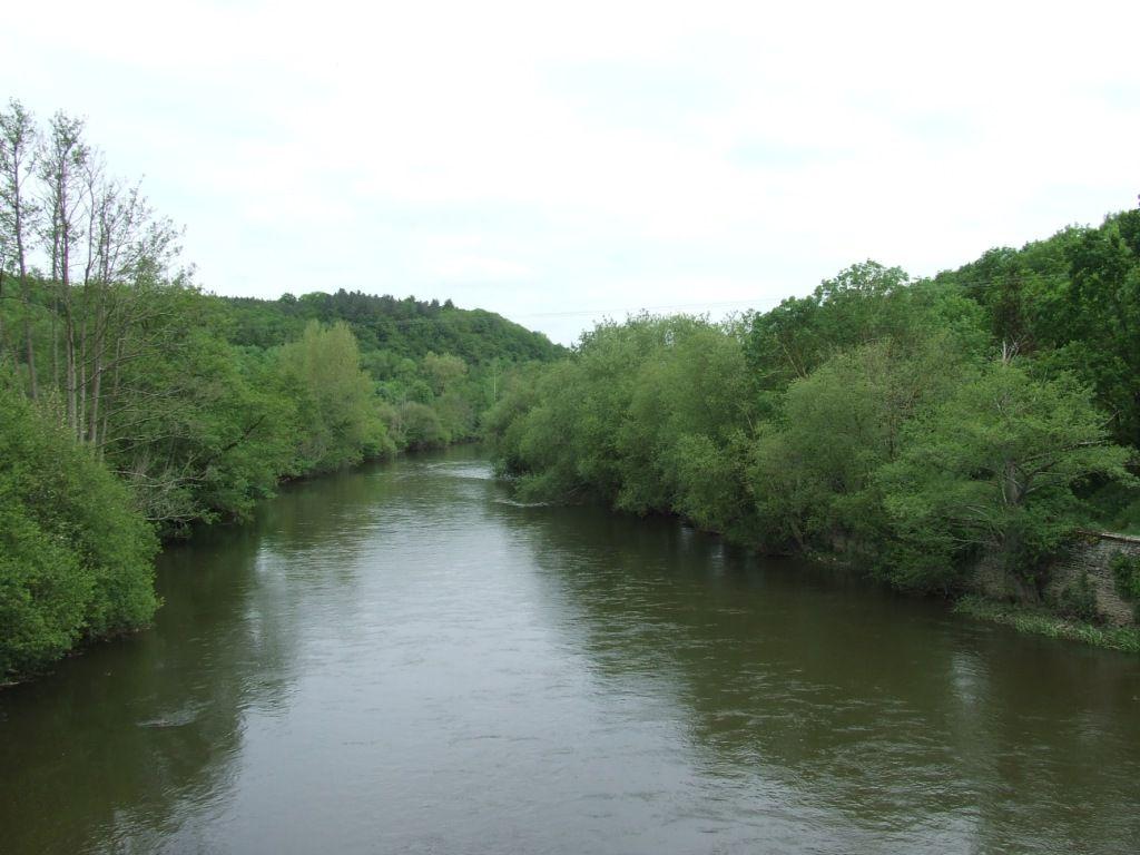 14 Looking north, down the Orne from Le Bas bridge. The infantry first forded the Orne at the far bend in the photo.