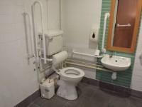 An ambulant toilet with wall-mounted grab rails is not available. The wash basin(s) tap type is lever. The lighting levels in the toilet(s) are good.