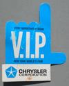 Lot # 381 - Cardboard Badge from the "Chrysler Corporation" pavilion. The badge is in the shape of a hand with large "V.I.P.