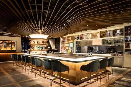 The design of the KIHARU Brasserie reflects a desire to remember that it occupies a space formerly occupied by the Kyogeki Dream Bowl bowling alley.