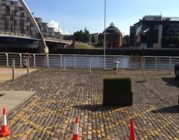 The walkway from the car park to the riverside entrance is paving slabs.