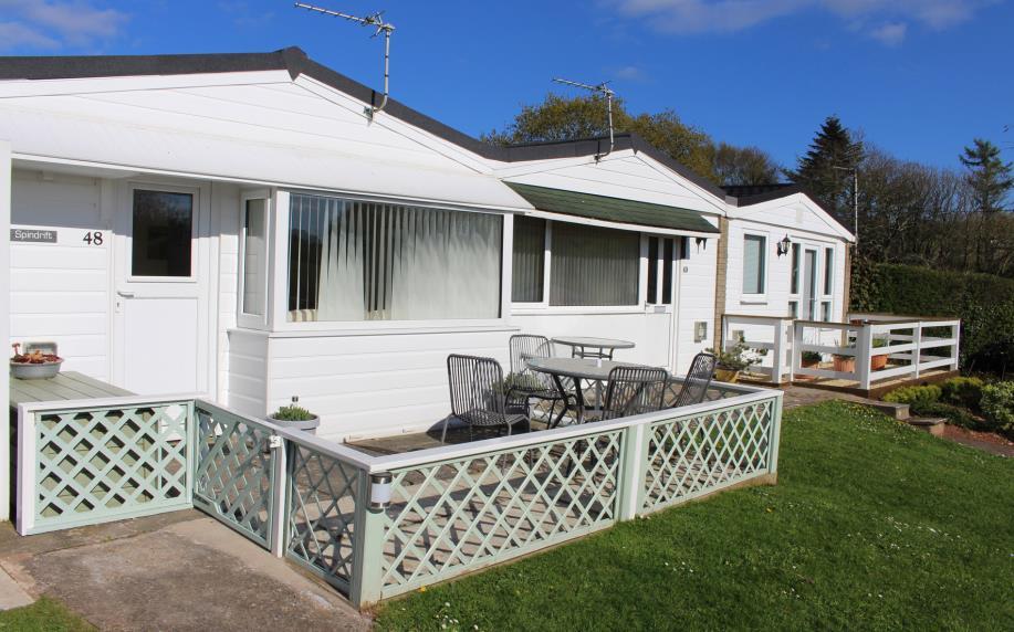 SPINDRIFT 48 GALMPTON PARK HOLIDAY BUNGALOWS Allocated parking space for one car further overflow parking available.