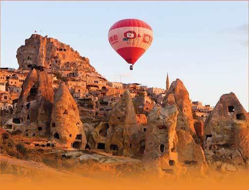 See hot air balloons float above the fabled fairy chimneys of unearthly Cappadocia, a UNESCO World Heritage site.