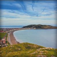 July JOINING RETURN Sat 2nd Llandudno 25.00.00 H 16:30 Llandudno is set on the North Wales rugged coastline, nestling between the Great and Little Orme, overlooking the Irish Sea.