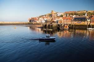 Set in the North Yorkshire Moors National Park, this architecturally picturesque town is the ideal place to stroll along the beach or enjoy some traditional fish and chips on the sea front!