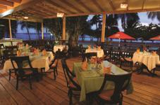 We stay at the Coconut Court Beach Hotel, located on a white-sand beach on the south coast of