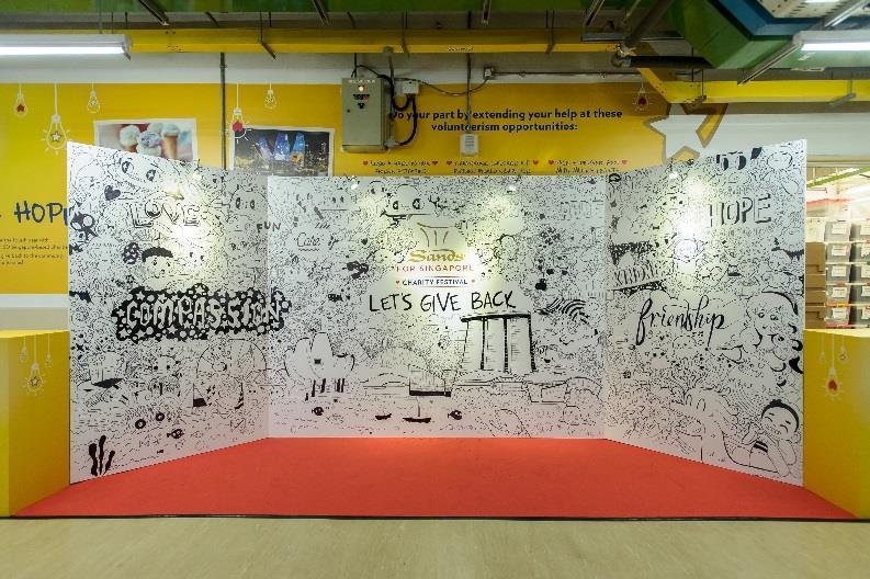 Members of the public turned up to catch the free movies and music at the Event Plaza during the first two days of the Sands for Singapore Charity Festival 2016 Doodle Wall and