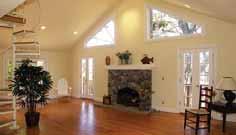 fireplace, custom woodworking, gourmet kitchen, & private study with secret door off the