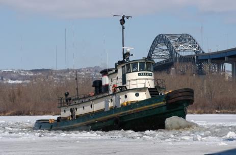 The 94-foot Seneca built in 1939, had just underwent several renovations and was being towed back to the Zenith Tugboat Co in Duluth, Minn. by another company owned tug boat to save fuel.